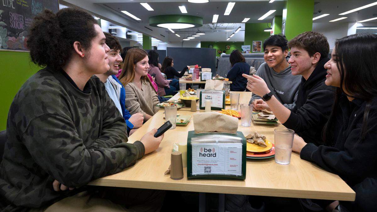 International students gather at The Greenery cafeteria at The Evergreen State College in Olympia, Washington, on Friday, Jan. 13, 2023.