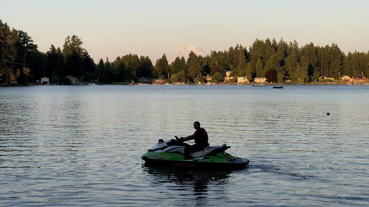 Lacey Fire District 3 crews have been searching Hicks Lake after an overturned kayak with personal belongings was found Monday evening.