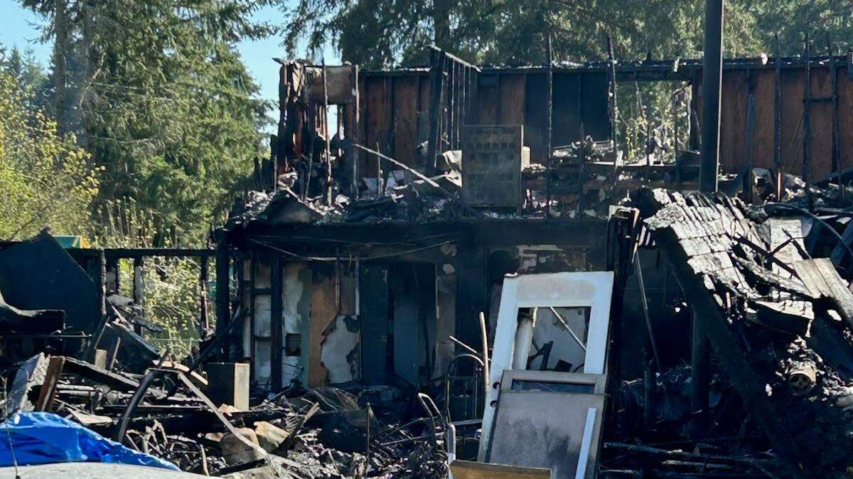A residential structure burned down near the intersection of Ayer Street and 80th Avenue Southeast in East Olympia the morning of Friday, April 18, 2025.