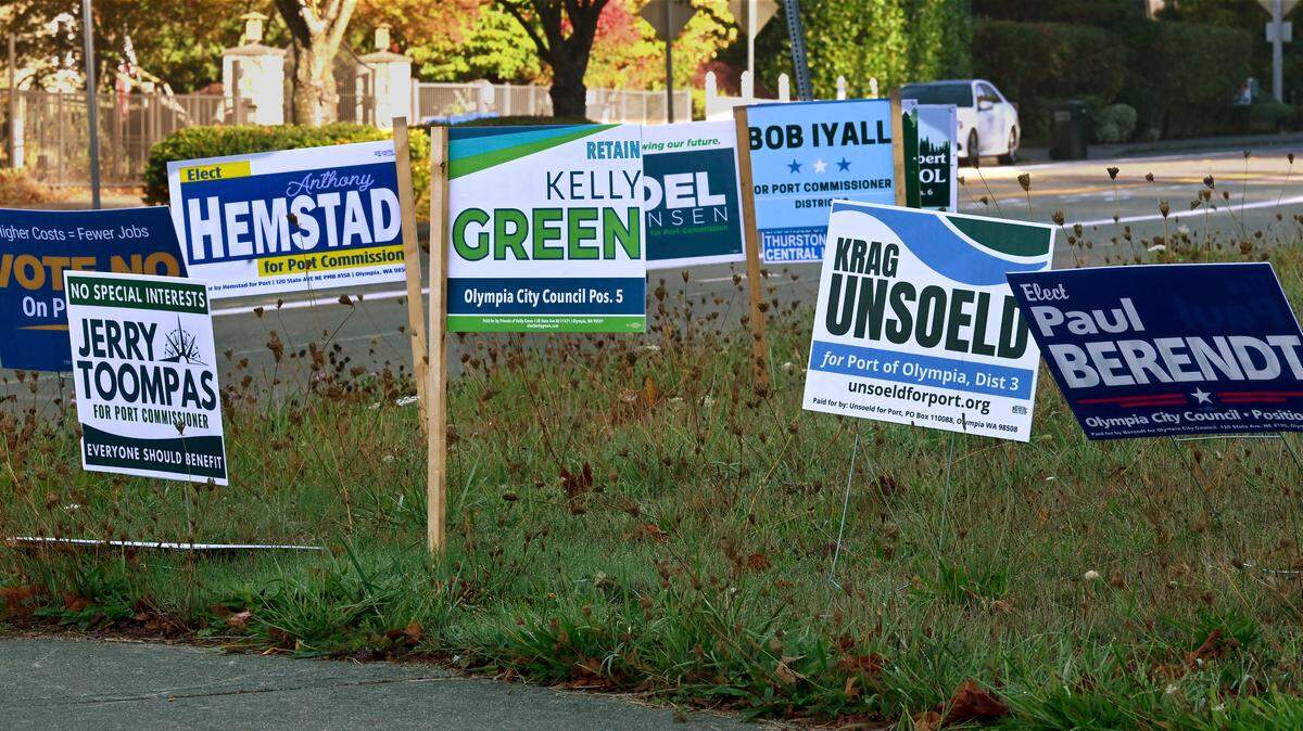Campaign signs can be seen across Thurston County.