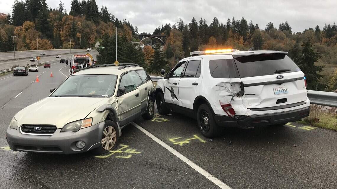 Car spins out, hits State Patrol cruiser near Olympia Wednesday