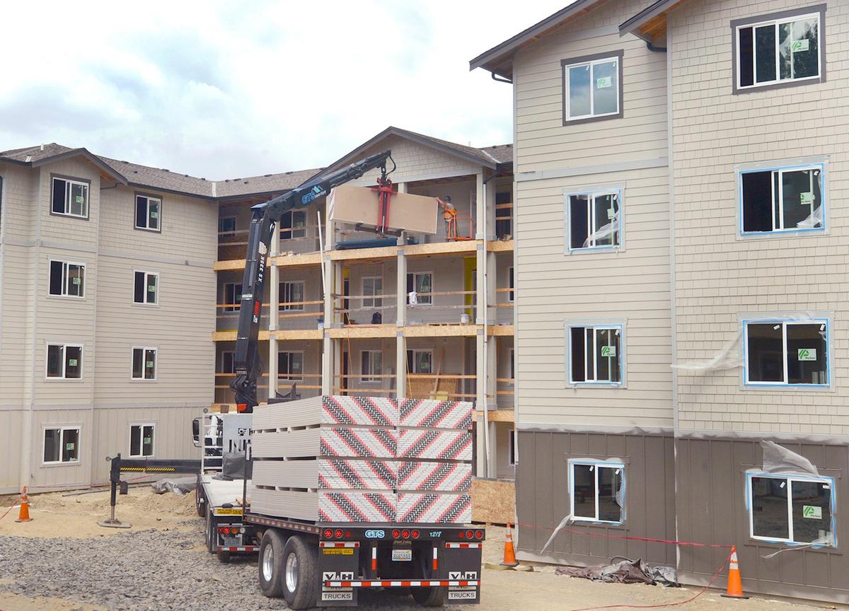 Merritt Manor, an 82-unit affordable housing development on Martin Way in Olympia, is expected to open toward the end of September. It occupies a site that was once home to the Bailey Motor Inn.