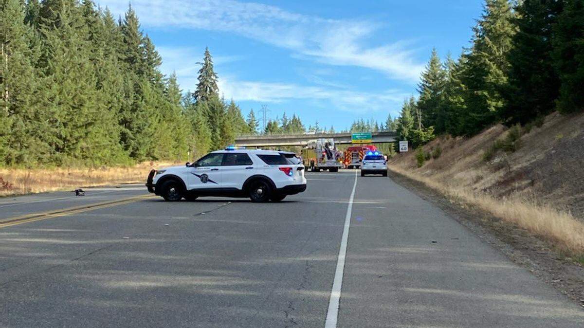 Washington State Patrol vehicles block off U.S. 101 near Shelton in both directions around a three-vehicle wreck on Wednesday morning.. Multiple people died and suffered serious injuries, according to Trooper Katherine Weatherwax.