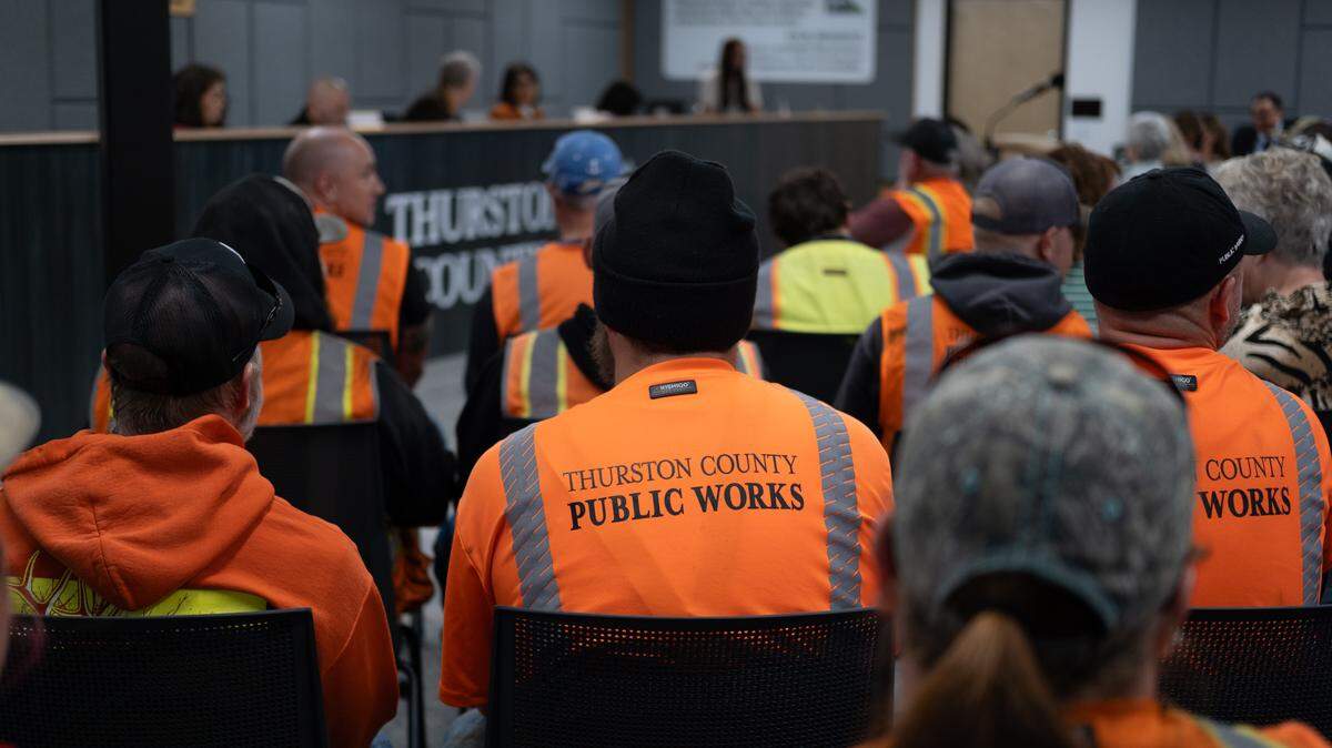 Thurston County road workers, allies deliver workplace grievances to commissioners