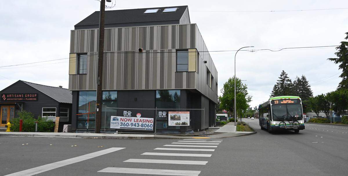 The Rookery, a new three-story mixed-use building in Tumwater at 6054 Capitol Boulevard SE. The building was designed and will be occupied by the Artisans Group. The remaining space is home to six, market-rate apartments. The currently are for lease.
