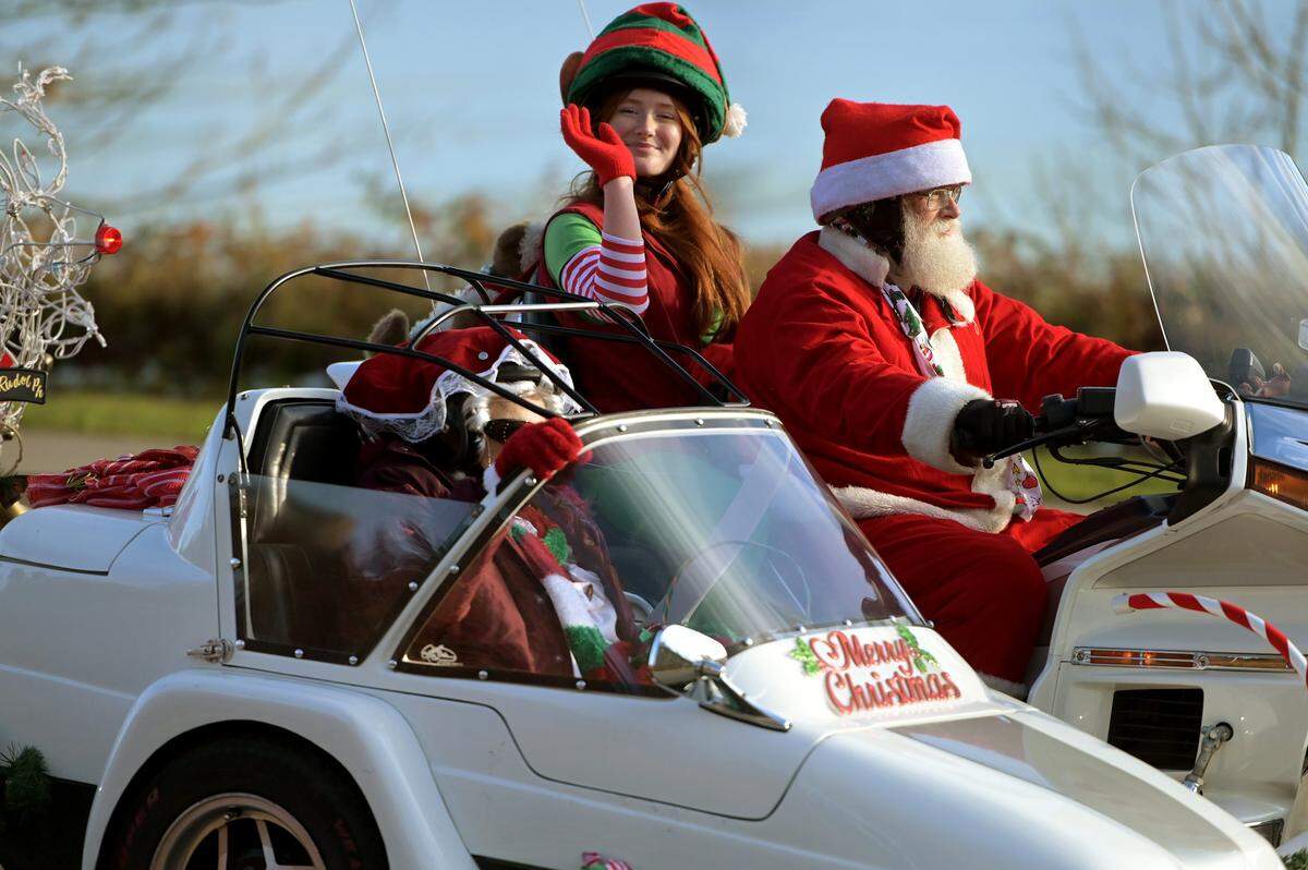 The roar of thousands of motorcycles echoed through the streets of downtown Olympia on Saturday, Dec 3, 2022, as riders stood in for Santa for the annual Olympia Toy Run. Gathering earlier in the morning at the South Sound Mall in Lacey they all set off for a 1 p.m. parade to Marathon Park along Capitol Lake to deliver thousands of presents Those donations are given directly to the Olympia Corps Salvation Army's “Toy n Joy” program, benefiting families in Thurston, Mason and Grays Harbor counties.