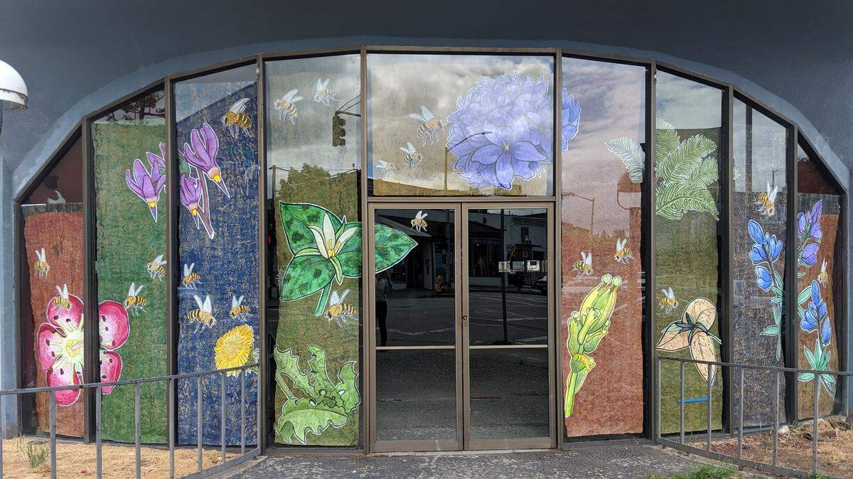 Kathy Gore Fuss and Randi Parkhurst added scenes of nature to the building at Fifth and Franklin that once housed a nightclub.
