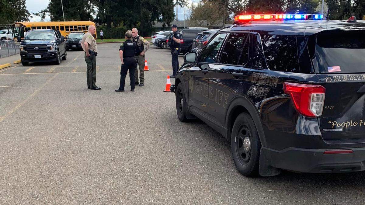 The Thurston County Sheriff’s Office is searching for a suspect who shot at officers after robbing a grocery store in Lacey on April 22.