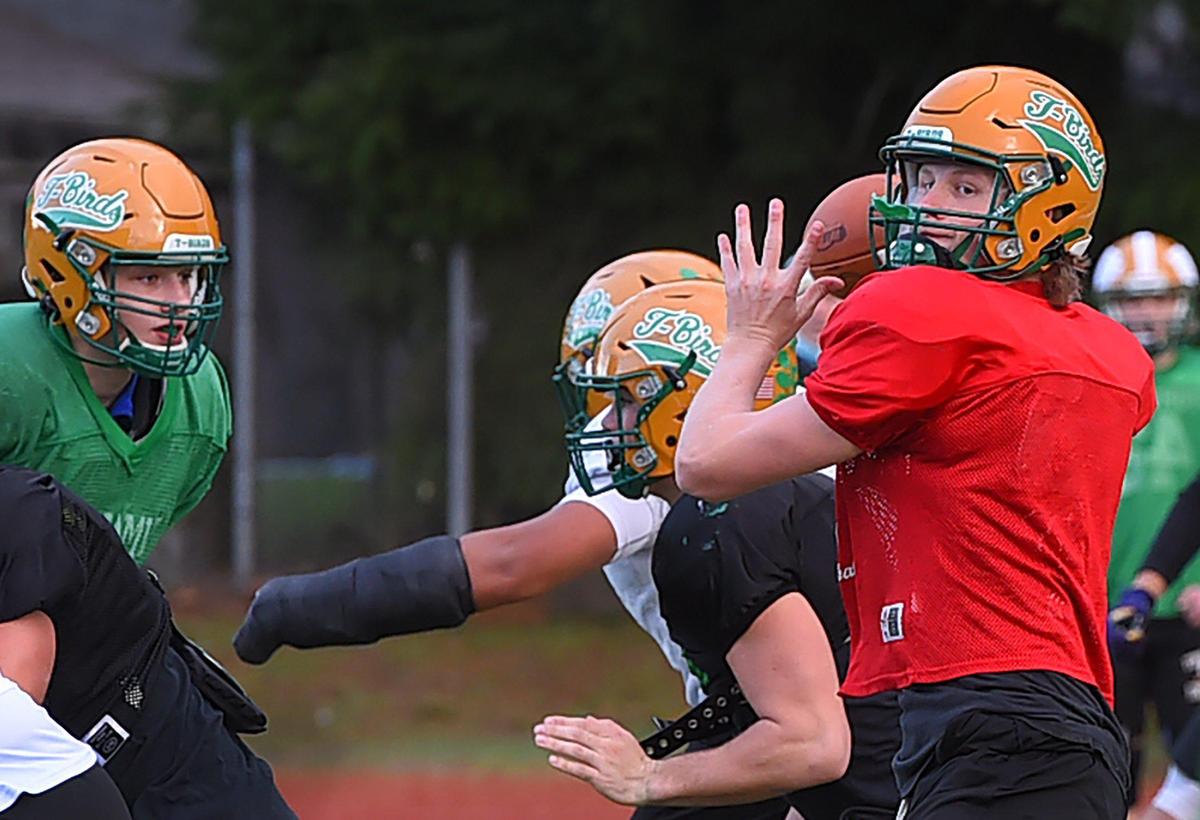 Tumwater QB Alex Overbay looks to pass during the T-BirdsÕ Dec. 1 practice in preparation for the Dec. 4 state champion ship game.