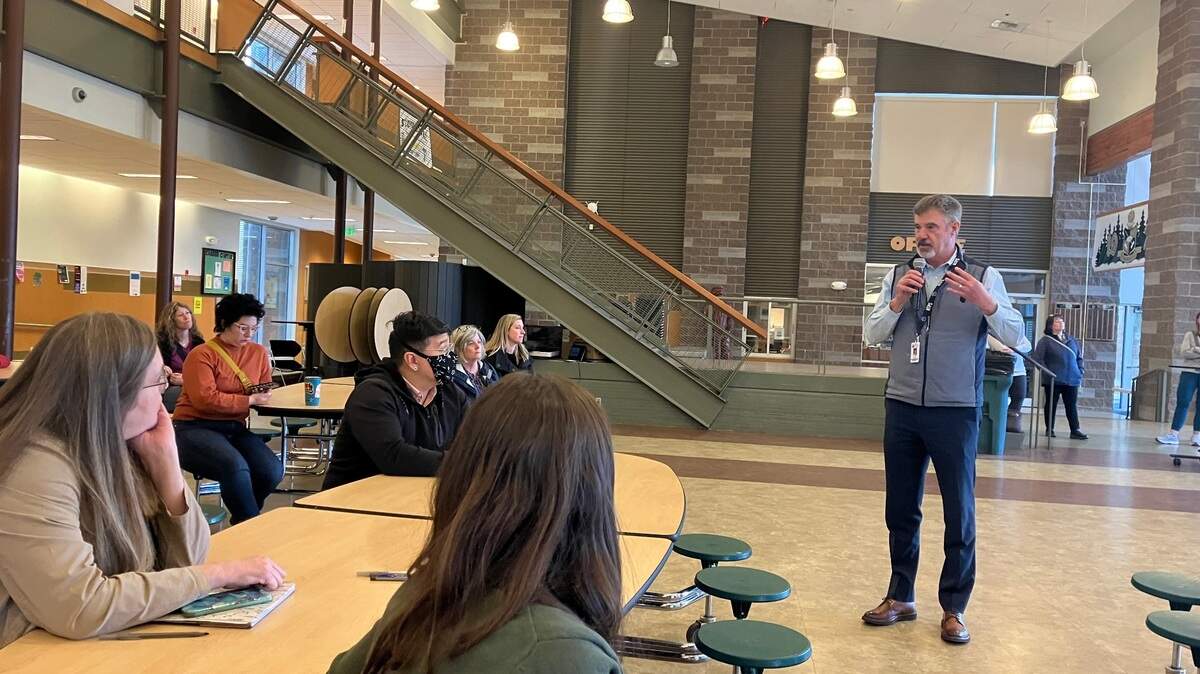 Assistant Superintendent of Operations Troy Oliver addresses parents at a boundary review community forum held Tuesday evening at Timberline High School.