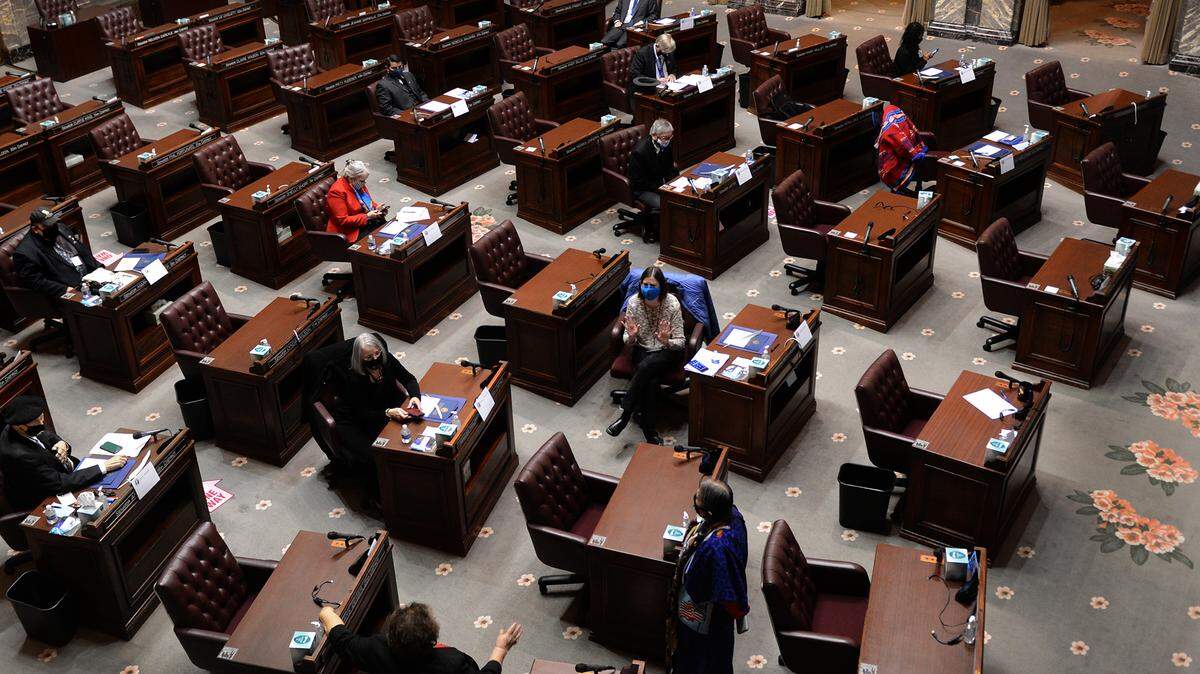 Washington state’s 12 electors assembled at a social distance in the state Senate Chambers on Monday to convene the 2020 Electoral College and cast their votes for the nation’s President and Vice-President.