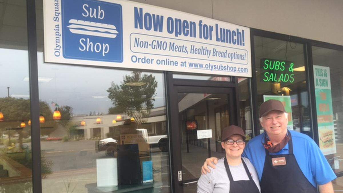 Olympia Square Sub Shop owner Randy McCartney (right) and employee Racheal Johnson, outside the new business at 3430 Pacific Ave. SE.