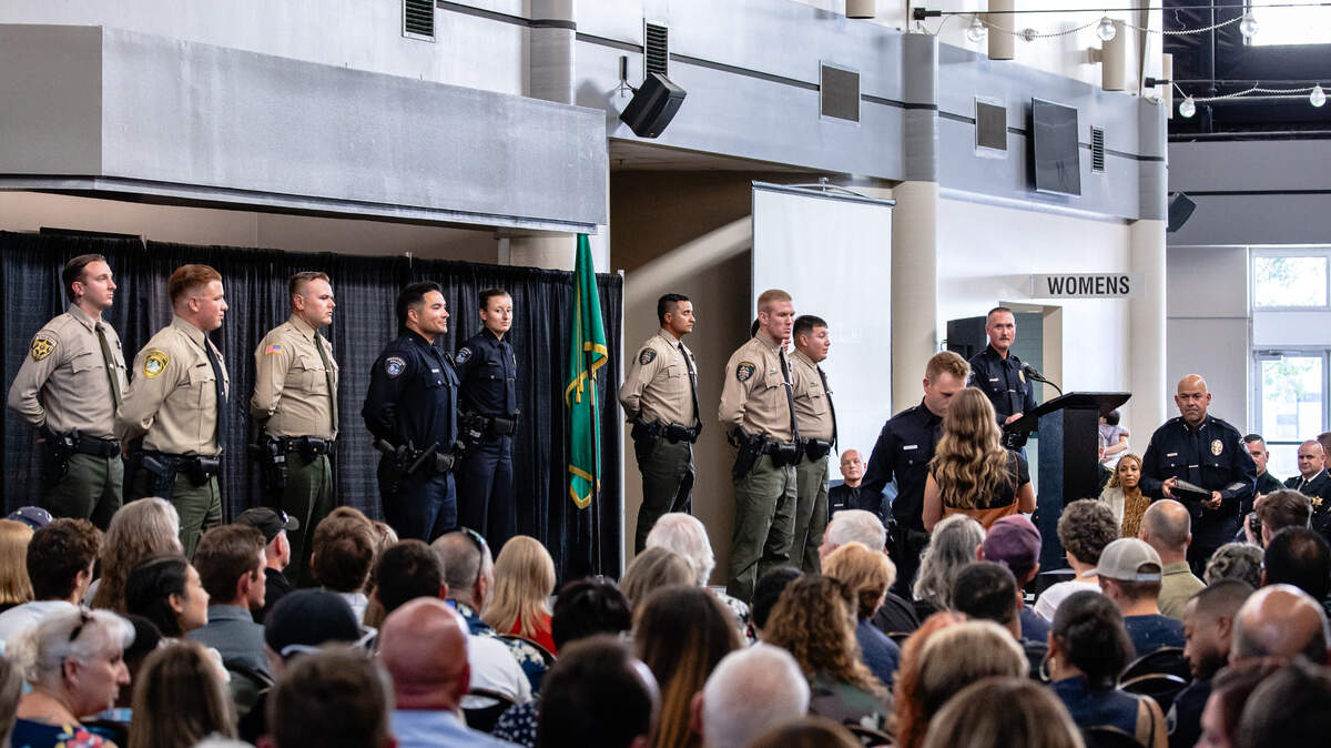 Law enforcement officers graduate from the Criminal Justice Training Center facility in Pasco on Sept. 14, 2023. Other facilities around the state are set to open soon.