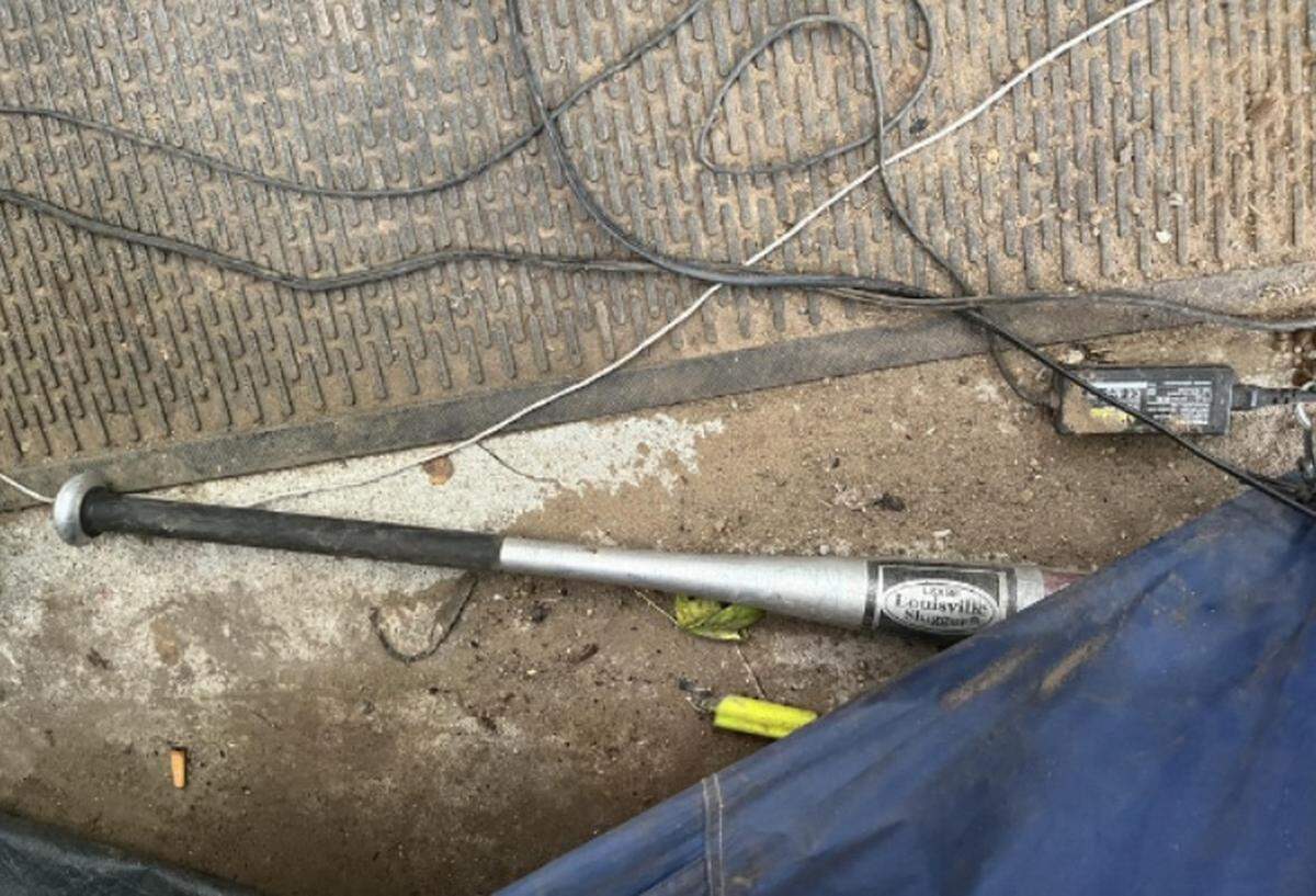 An aluminum baseball bat allegedly used to assault a woman at the “Jungle” homeless encampment on June 18, 2025.