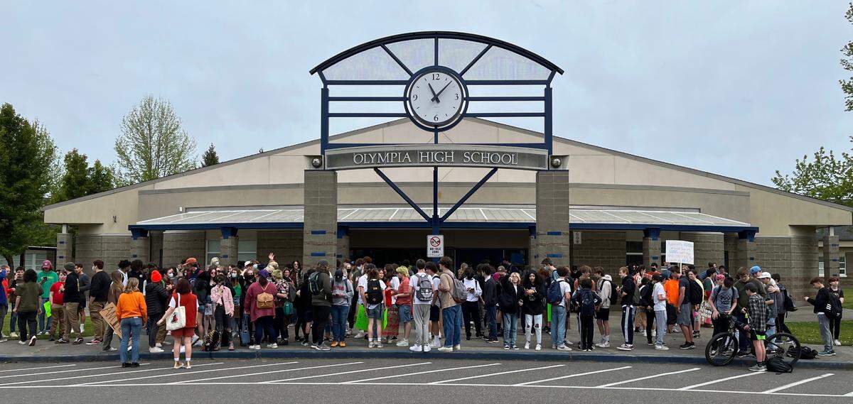 Students at Olympia High School walk out on their way to an anti-gun violence rally at the Capitol Campus.