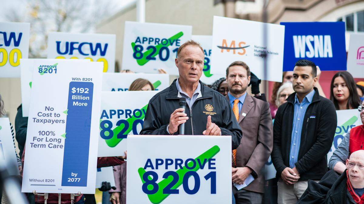 Greg Markley, division chief for the Puget Sound Regional Fire Authority, spoke in favor of Ballot Measure 8201 at a news conference in Seattle on Oct. 9, 2025.