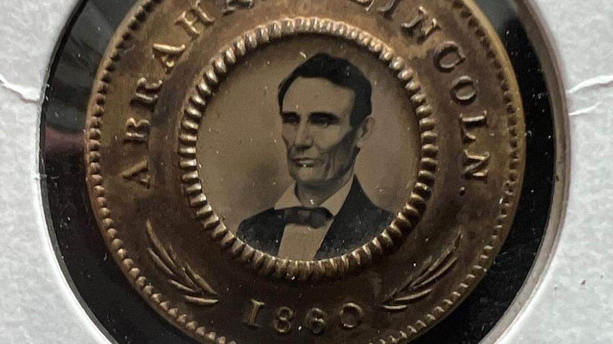A lost 1860 campaign button for Abraham Lincoln is included in an auction hosted by the Washington state Department of Revenue.
