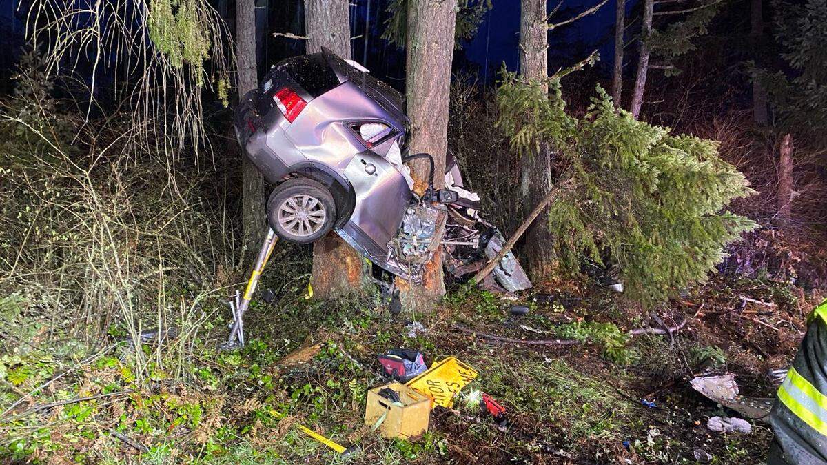 The 42-year-old woman drove off the road and crashed her car between two trees east of Lacey Friday night, according to Washington State Patrol.