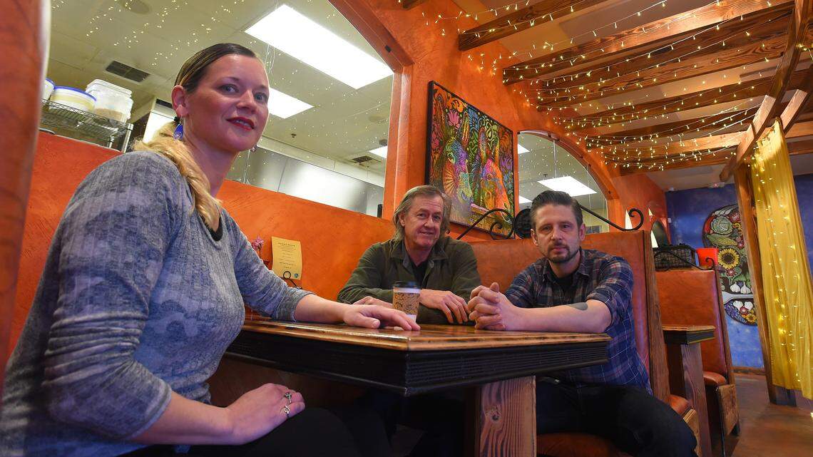 Hart Mesa owner Joel Hart (right) sits in the dining room of La Mariposa, the former west Olympia Don Juan’s Mexican Kitchen & Cantina. With him are Geneva, left, the house manager, and Fritz Byerly, one of the owners.