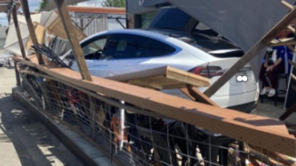 The driver was headed east on Harrison Avenue when police say he lost control and crashed into an outdoor seating area for the Westside Tavern.