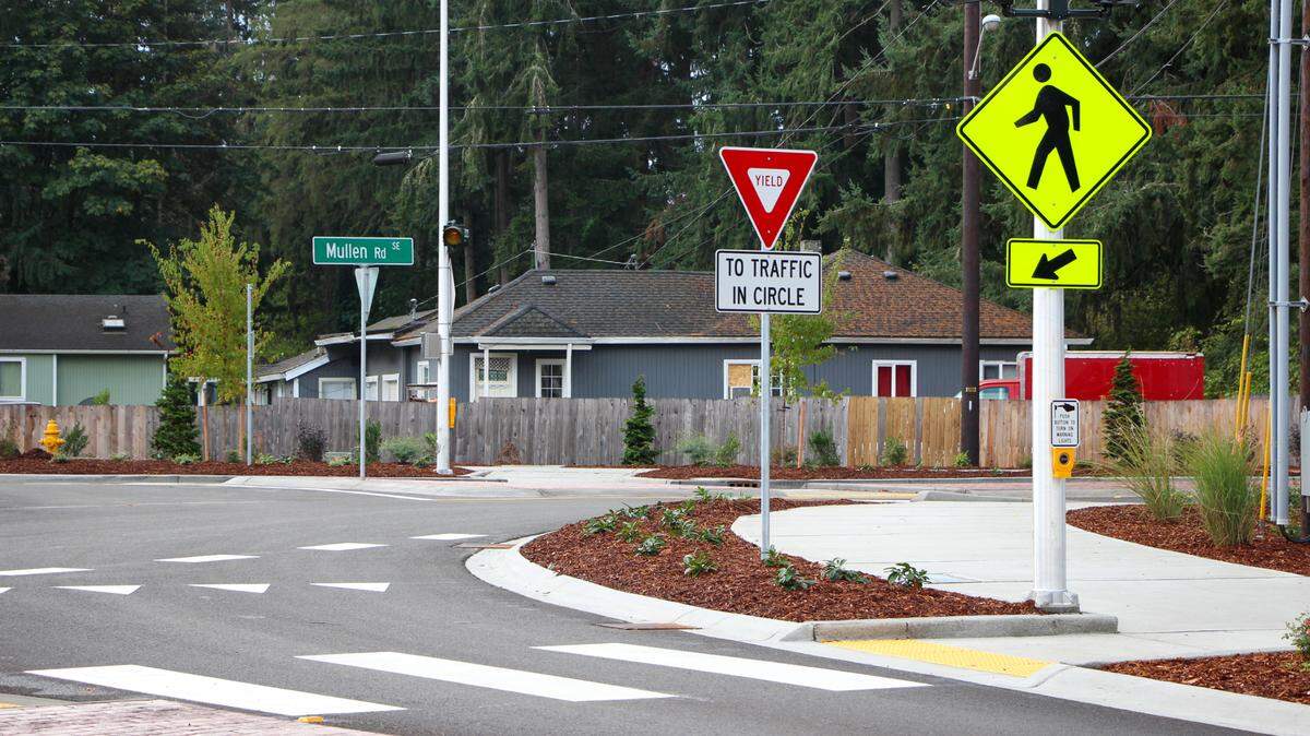 An $11 million project to improve about a mile of Mullen Road Southeast in Lacey added a new roundabout at Carpenter Road, sidewalks, crosswalks and improved lighting. Thurston County and Lacey officials celebrated the project’s completion during a ribbon cutting ceremony on Friday, Oct. 1, 2021.