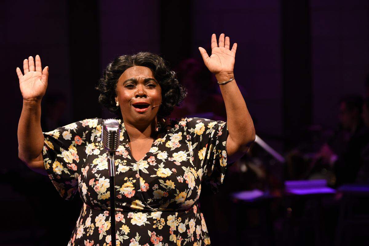 Edsonya Charles plays Ann Collier in “The 1940s Radio Show.”