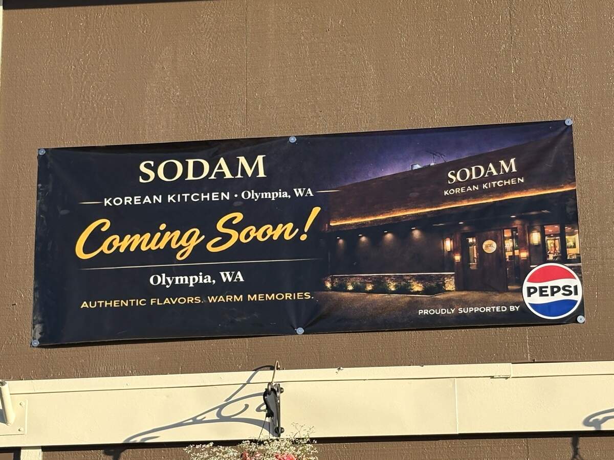 A sign announces that a restaurant called Sodam Korean Kitchen is coming soon to downtown Olympia.
