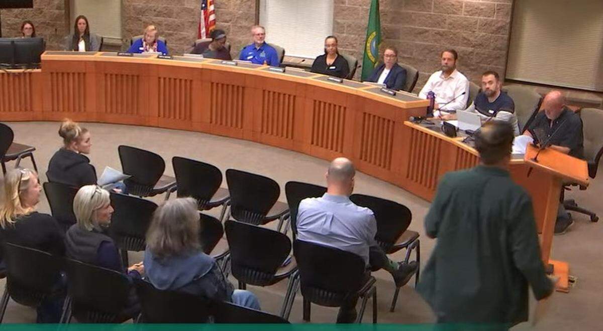 Hawks Prairie resident Larry Taylor approaches the lectern at the Lacey Planning Commission meeting on Wednesday, Oct. 8, 2025.