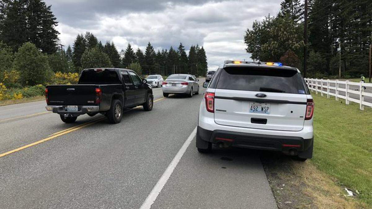 Traffic on state Route 3 was slowed for three hours on Saturday after a man crossed the center turn lane in his vehicle and sideswiped a car, according to the Washington State Patrol.