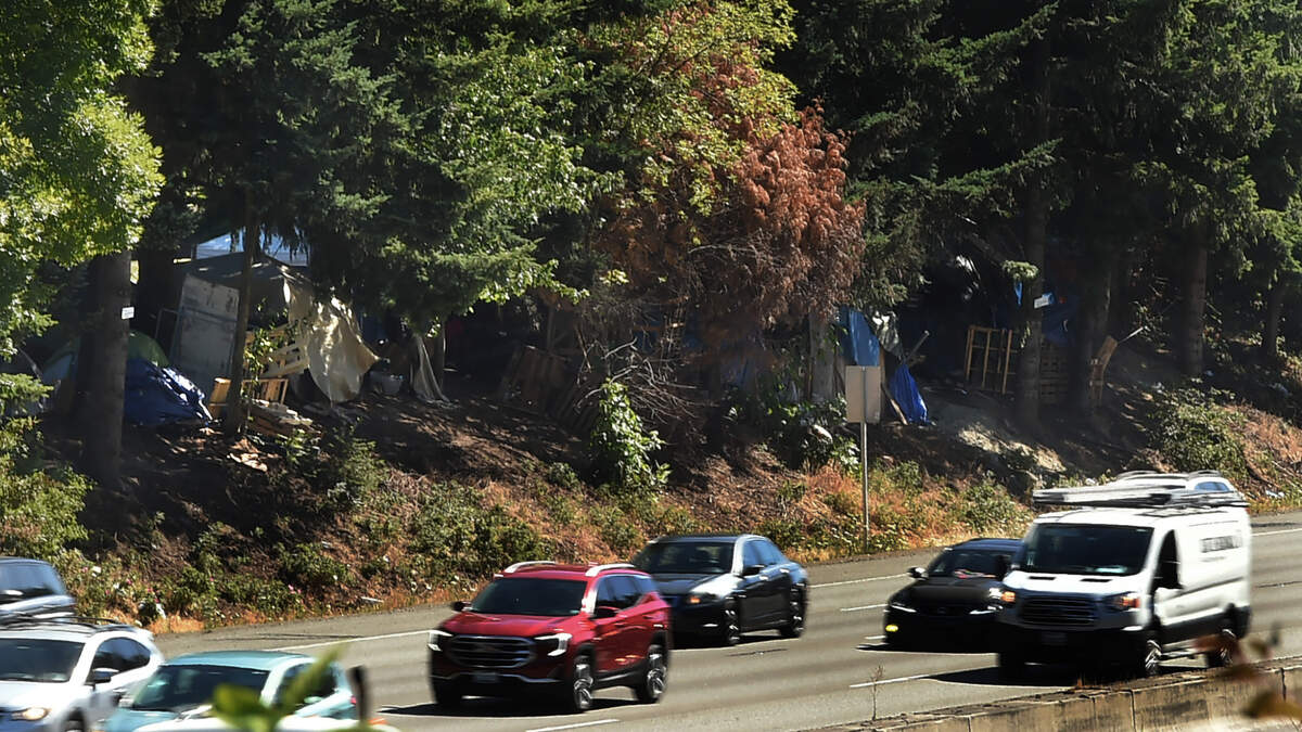 The homeless encampment community along Interstate 5 and near the Sleater Kinney Road NE overpass has dwindled in recent weeks as alternative housing options begin to become available. Photo July 18, 2023