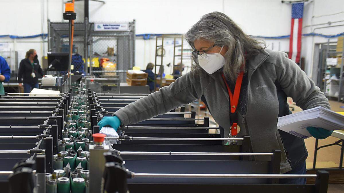 Ballots for the Nov.2 general election are tabulated Tuesday at the Thurston County Ballot Processing Center in Tumwater.
