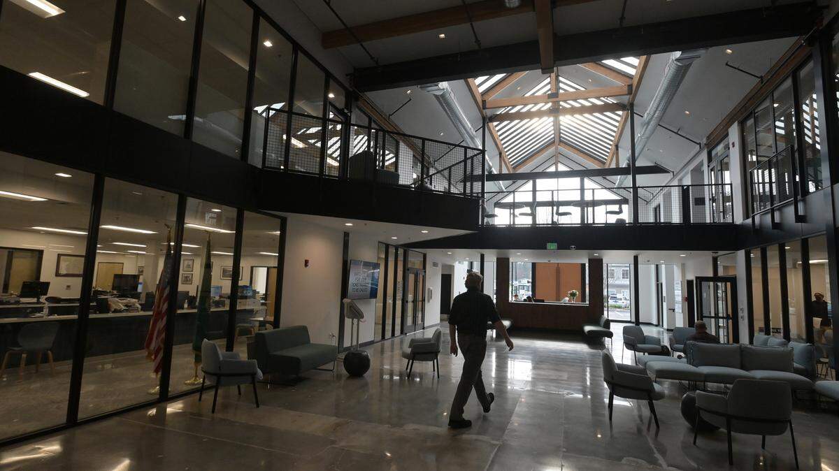 Shown: Main floor …Assistant County Manager Robin Campbell gives a Dec. 13, 2022 tour of The Atrium, Thurston County’s new 90,000-square-foot office complex locate at 3000 Pacific Ave. in Olympia.