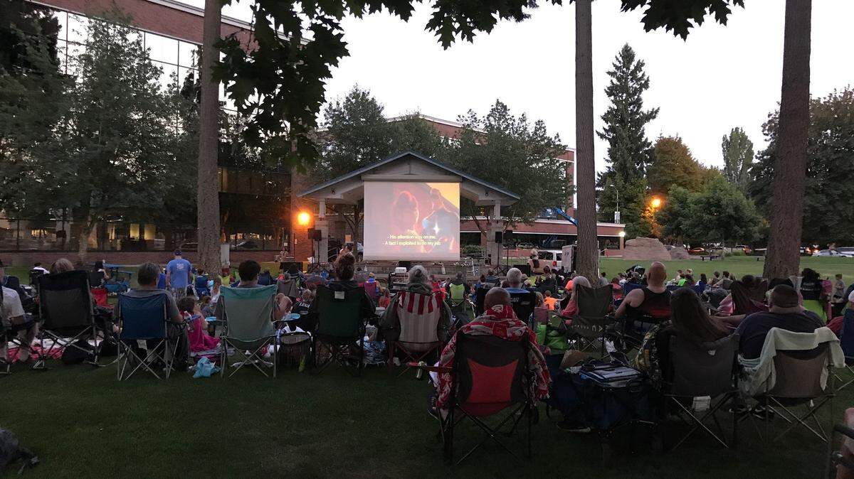 A crowd at Lacey’s Huntamer Park watches “The Incredibles.”