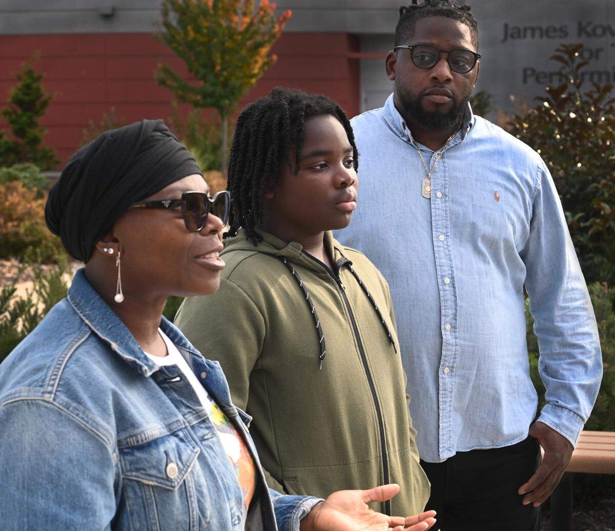 Speaking in front of South Sound Stadium in Lacey on Oct. 13, parents James and Bassie Whipple say they fully support their son. They also were former volunteers removed by the organization from team activities.
