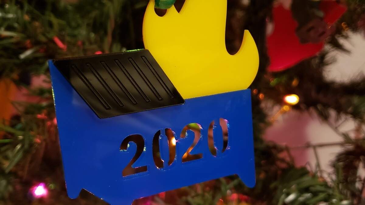 A dumpster fire 2020 ornament by Lisa Dyvig.