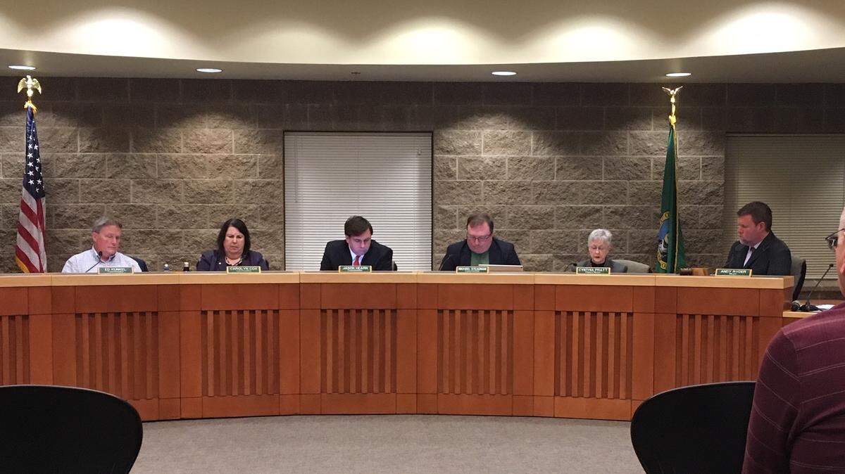 A River Ridge High School student and a longtime Lacey resident were recognized before Lacey City Council Thursday night for recent acts of bravery.