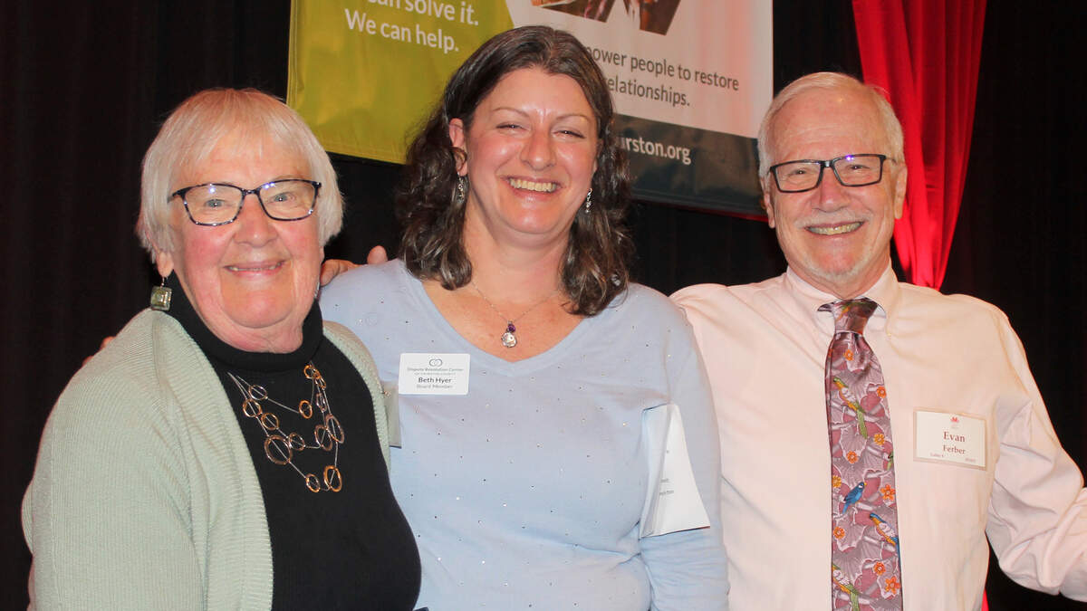 Rev. Carol McKinley (left), recipient of the 2019 Evan Ferber Peacemaker Leadership Award, with Dispute Resolution Center of Thurston County Board member Beth Hyer and Founding Executive Director Evan Ferber.