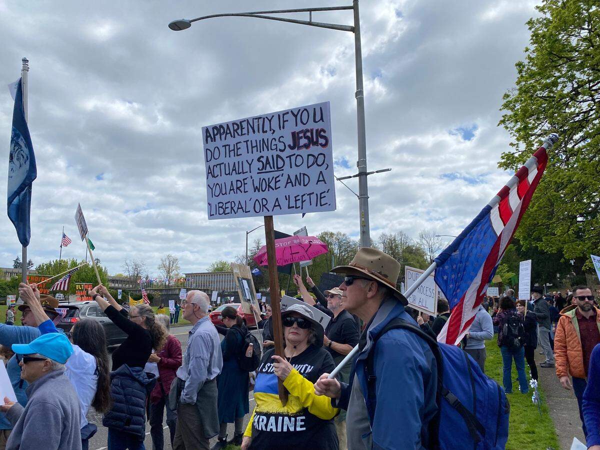 Easter weekend seemed to inspire a number of signs at Saturday’s rally against President Donald Trump’s actions since taking office in January.