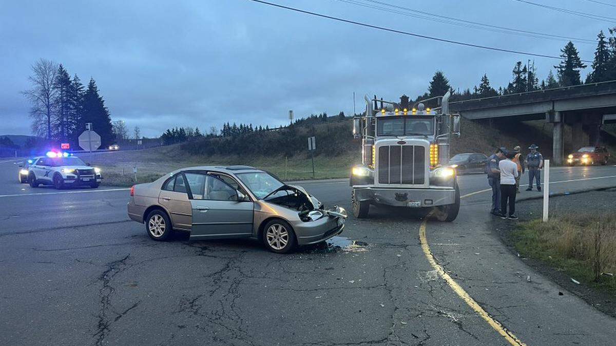 The wreck between a car and semi-trailer was reported near Elma about 4:20 p.m. Monday, according to Washington State Patrol.