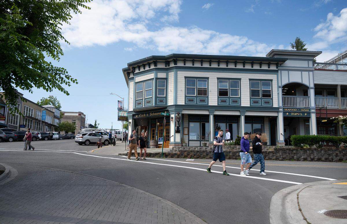Visitors explore Friday Harbor, Washington, on San Juan Island on Monday, June 26, 2023.