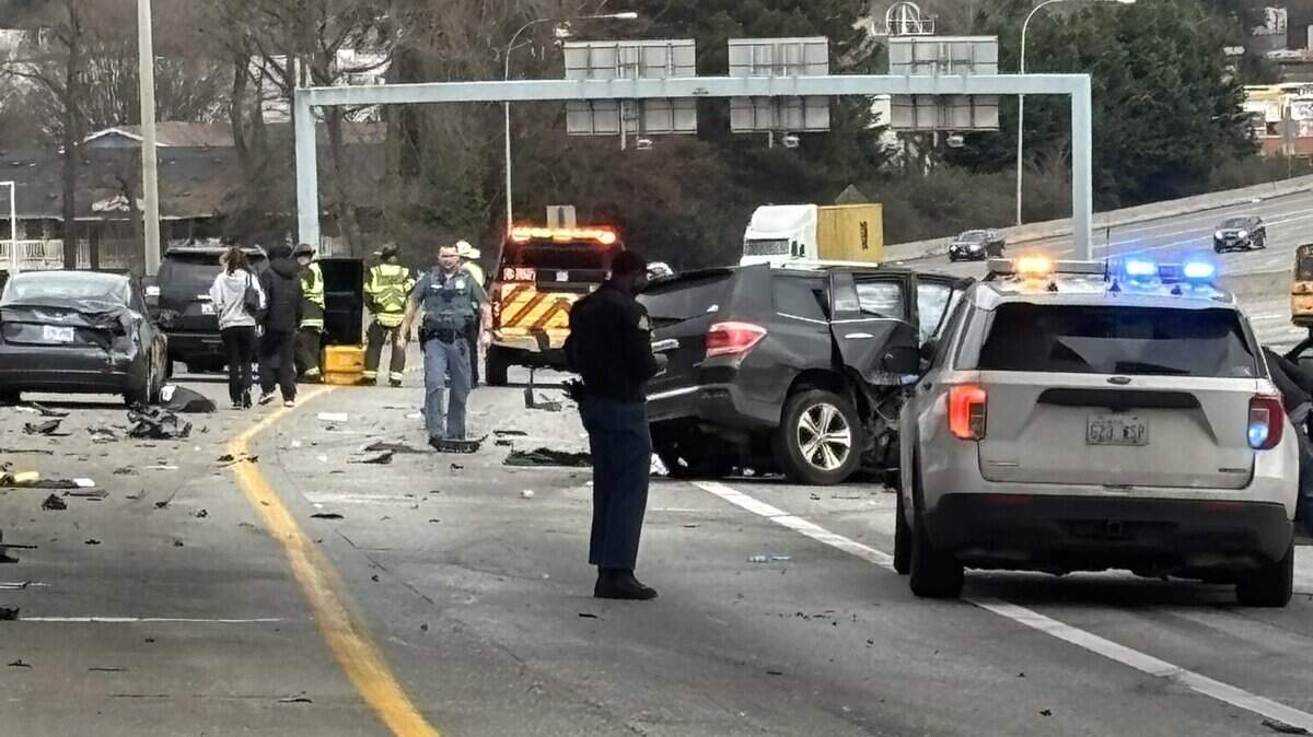 The SUV driver was ejected from it before it went over the railing of an overpass and landed on northbound I-5, according to Washington State Patrol
