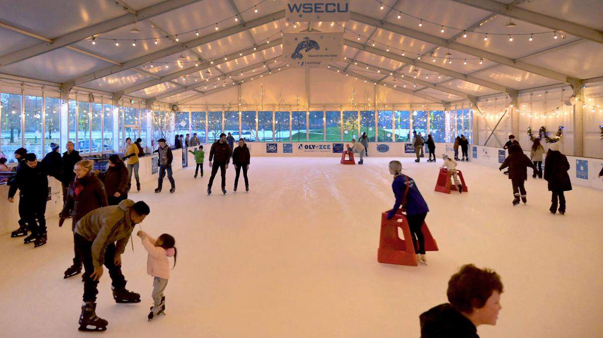 Skaters enjoy a taste of winter fun at the Oly on Ice skating rink across from Capitol Lake during its 2023 stint. 