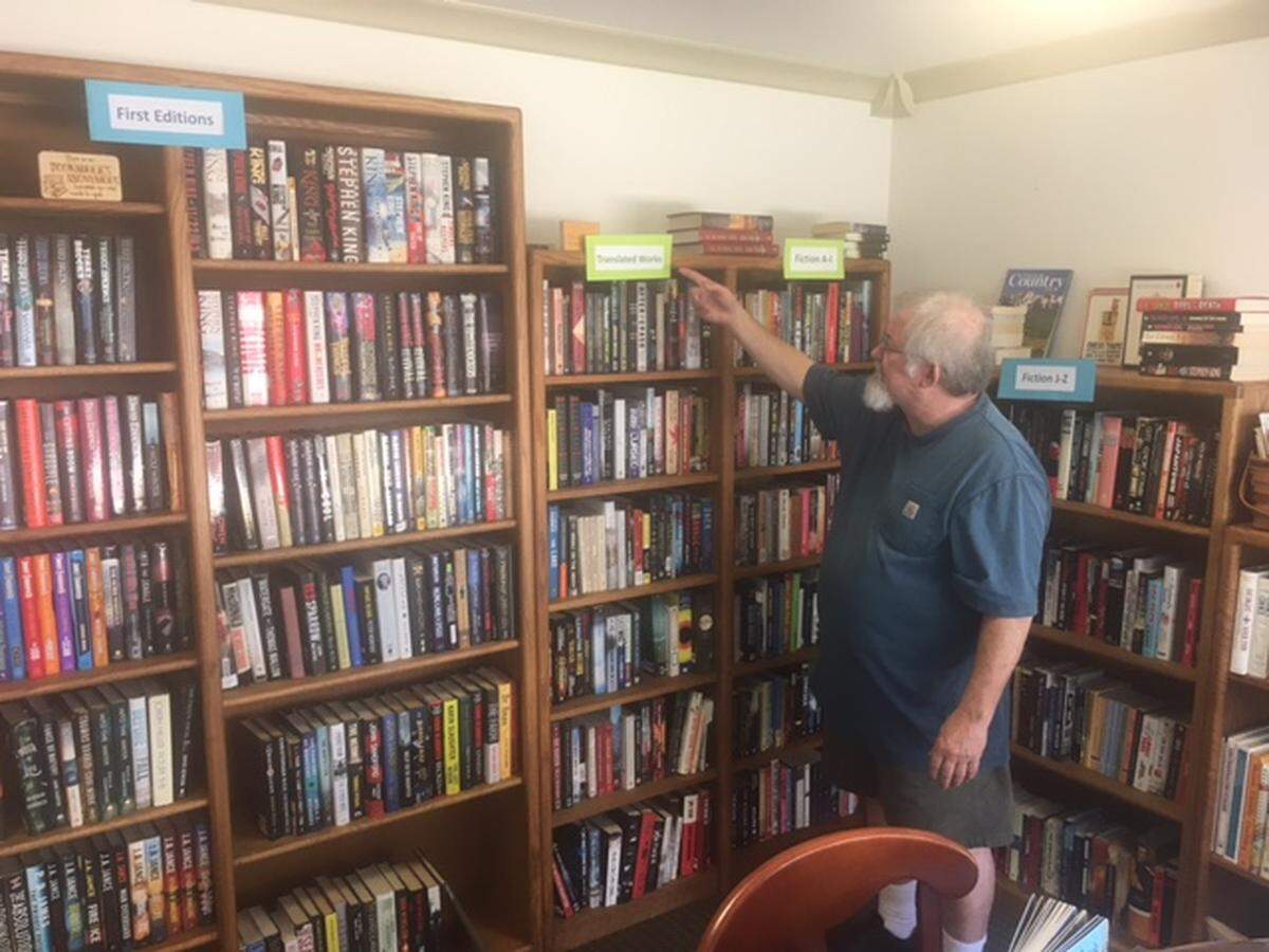 Turtleman Books owner Murlin Varner points out the “translated works” section of his used bookstore in Olympia’s south Capitol neighborhood, 108 22nd Ave SW, Suite 4.