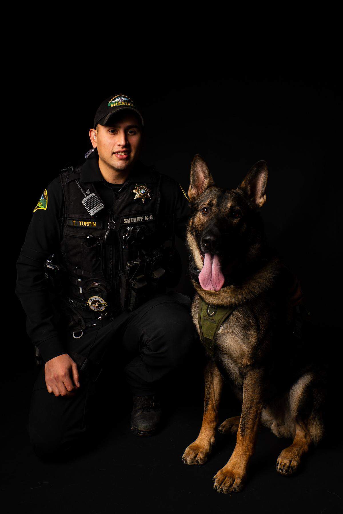 Tyler (Turpin) McCoy, a 30-year-old former deputy, is challenging Thurston County Sheriff John Snaza in the 2022 election cycle. McCoy has built a large social media following with his dog Arlo, a retired K9.