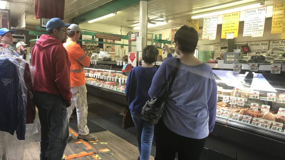 Even mid-week the lines are long at Stewart’s Meat Market in Yelm.