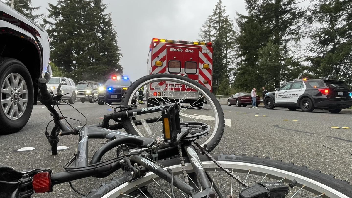 A fallen bicycle rests in the middle of College Street and 3rd Avenue Southeast following a collision on Wednesday, Sept. 18, 2024. Lacey Fire District Three shared this photo of the scene on Facebook.