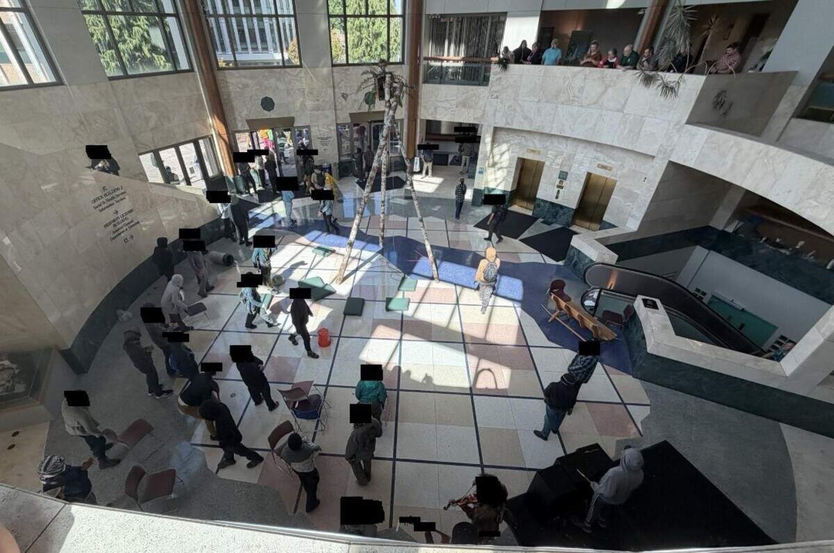 Protesters occupy the Washington state Department of Natural Resources building in Olympia on Tuesday, July 7, 2026. An anonymous person sent The Olympian photos of the scene and censored the faces of the individuals present. The person did not respond to a request to identify themselves as of Thursday.