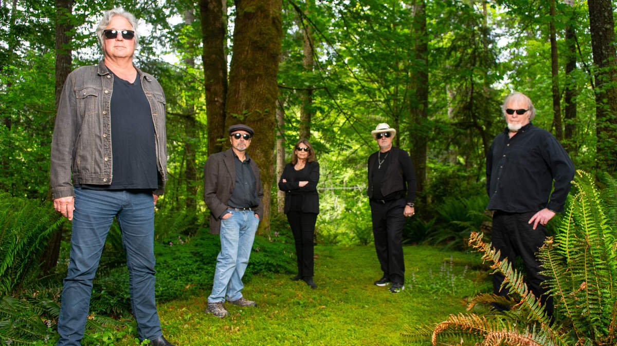 The True Olympians are, from left, drummer Michael Stein, keyboard player Joe Cason, singer Lisa Ceazan, bassist Gene Tveden and singer-songwriter-guitarist Tom Dyer, the creator of “Olympia: A True Story.”