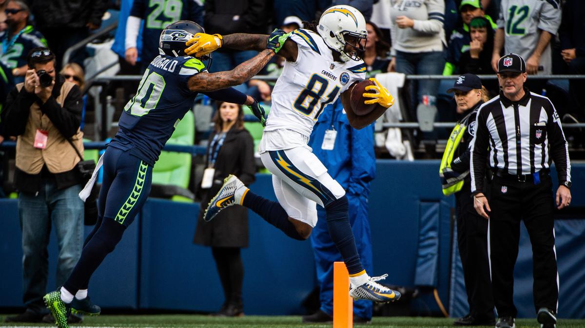 Chargers wide receiver Mike Williams (81) fights off Seahawks safety Bradley McDougald (30) for a touchdown in the second quarter. The Seattle Seahawks played the Los Angeles Chargers in a NFL football game at CenturyLink Field in Seattle, Wash., on Sunday, Nov. 4, 2018. 

