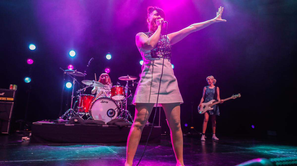 Bikini Kill performs at the Hollywood Palladium. Tobi Vail of Olympia is the drummer. Kathleen Hanna is the lead singer and Kathi Wilcox is the bassist.
